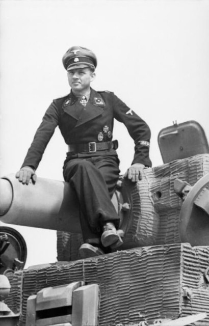 German tank commander Michael Wittman, photographed one month prior to Operation Overlord. This panzer ace, Waffen SS captain, single handedly destroyed a British Battalion at Villers Bocage in his Tiger Tank (Image).