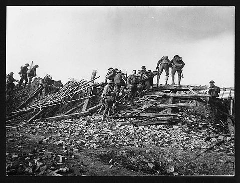 'In the track of the Hun. The first of our men to cross the Somme, near Peronne.' Courtesy of the National Library of Scotland.