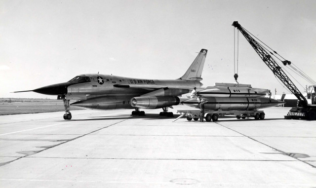 Convair RB-58A Hustler 3/4 front view (S/N 58-1011). Note the two component pod (TCP) being assembled. (U.S. Air Force photo)