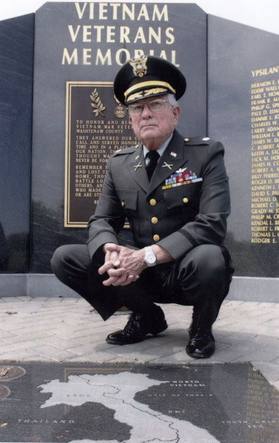 Retired U.S. Army Lt. Col. Charles Kettles poses in front of the Vietnam Veteran’s Memorial in Ypsilanti Township, Michigan, 2009. (Photo courtesy of Retired U.S. Army Lt. Col. Charles Kettles)
