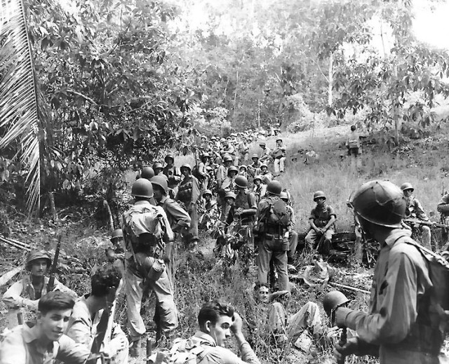 United States Marines rest in the field during the Guadalcanal campaign