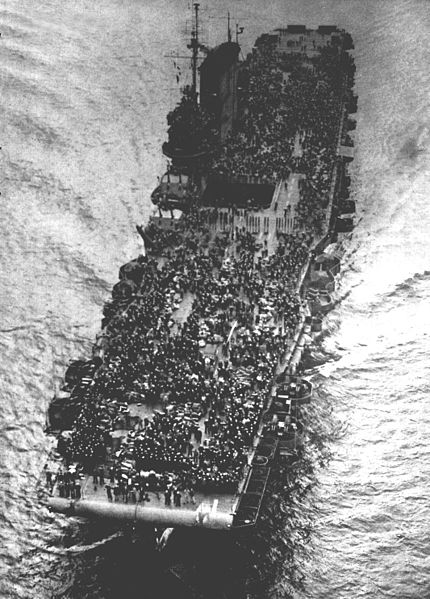 The U.S. Navy aircraft carrier USS Saratoga (CV-3) during her role as a troop transport in operation "Magic Carpet". By the end of her "Magic Carpet" service, Saratoga had brought home a total of 29,204 Pacific War veterans, more than any other individual ship.