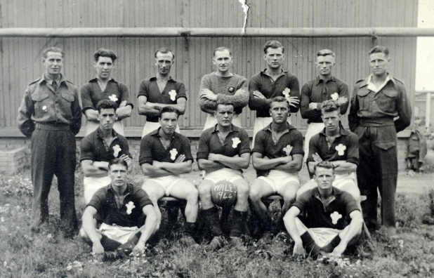 Prisoner of war Ron Jones (centre, back row) - the goalkeeper for the Welsh team in the Auschwitz football league.