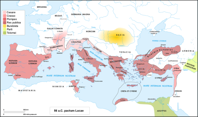 Roman world in 56 BC, when Caesar, Crassus and Pompey meet at Luca for a conference in which they decided: to add another five years to the proconsulship of Caesar in Gaul; to give the province of Syria to Crassus and both Spains and Africa to Pompey. Image Credit.