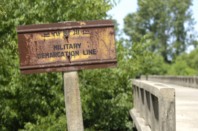  Military Demarcation Line sign. There are over 1,200 of these along the line. Wikipedia / Public Domain