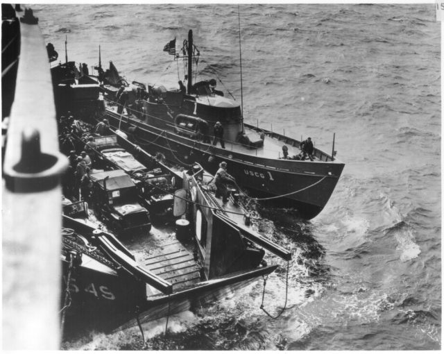 CGC-1 Tied up to an LCT, next to the Samual P. Chase, one of the hospital ships at D-Day. Source: USCG.mil/public domain