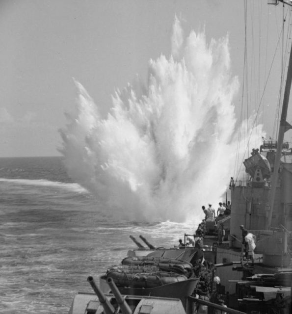 The HMS Ceylon dropping a depth charge on January 5, 1944 Image Source: Wikipedia 