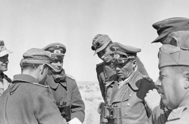 Rommel conversing with his staff near El Agheila. Photo Credit.