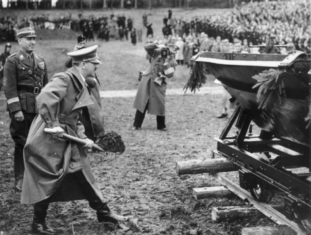 7 April 1938: Hitler turns the first sod at Walserberg, on the left Fritz Todt. Photo Credit.