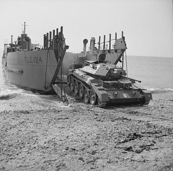 A Crusader I tank emerges from the tank landing craft TLC-124, 26 April 1942 By Malindine (Lt) War Office official photographer - This is photograph H 19057 from the collections of the Imperial War Museums (collection no. 4700-37), Public Domain, https://commons.wikimedia.org/w/index.php?curid=723404