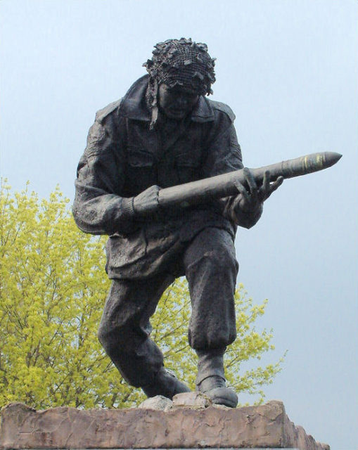 Statue of John Baskeyfield VC at Festival park, Etruria, Stoke-on-Trent. By Sculptors Steven Whyte and Michael Talbot. By Steve Birks, CC BY-SA 3.0, https://commons.wikimedia.org/w/index.php?curid=8962629