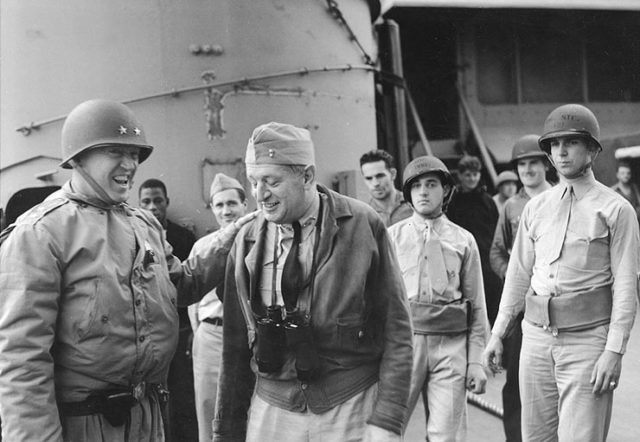 General Patton (Left) Shares a Joke With Admiral Hewitt. Wikipedia / Public Domain