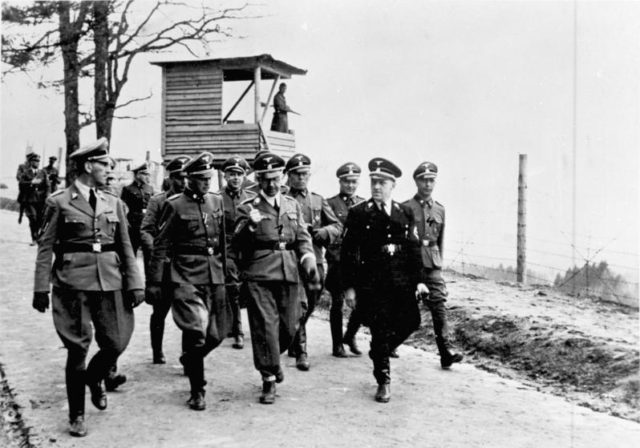 Himmler, Ernst Kaltenbrunner, and other SS officials visiting Mauthausen concentration camp in 1941. Photo Credit.