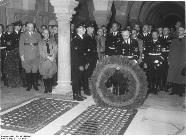 Himmler, laying a wreath in the crypts of the castle.