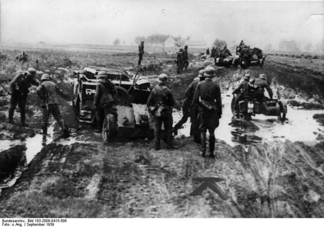 German motorized troops traveling on muddy road in Poland, Sep 1939 [
