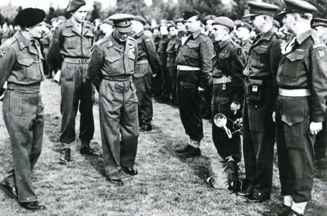 Bill Warhurst, standing second from right, is introduced to King George VI