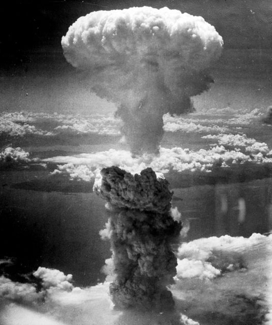 The mushroom cloud from the nuclear explosion over Nagasaki rising 60,000 feet (18 km) into the air on the morning of 9 August 1945.