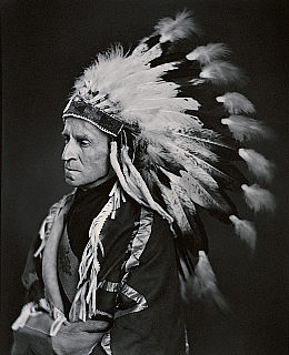 The Lord Tweedsmuir in Native headdress, 1937 