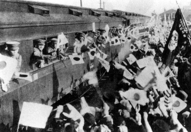 Most troops during WW2 were transported by either train or boat. These Japanese troops are boarding a train in Okinawa. Image source: Wikimedia Commons/ public domain.