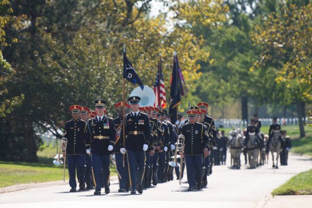 Soldiers from the U.S. Army Band, “Pershing’s Own,” and the 3d U.S. Infantry Regiment (The Old Guard), participate in the graveside service for U.S. Air Force 1st Lt. Donald Beals at in Arlington National Cemetery, Oct. 17, 2016, in Arlington, Va. Beals died when his single-seat P-47D “Thunderbolt” was struck by intense anti-aircraft fire above Lonnewitz, Germany on April 17, 1945. His remains were recently recovered and identified. (U.S. Army photo by Rachel Larue/Arlington National Cemetery/released)