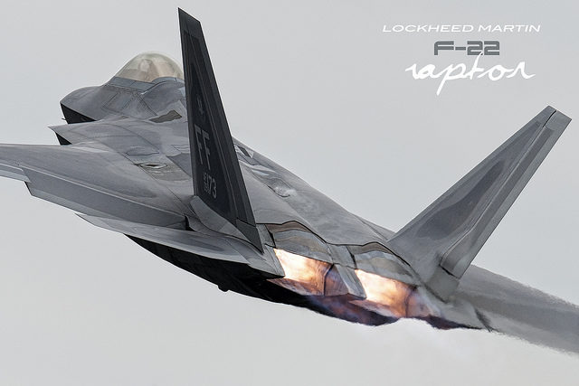 An F-22 Raptor rising into the sky