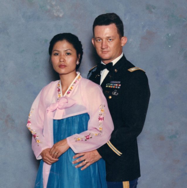 Retired Army Lt. Col. Stephen Tharp is pictured with his wife, Chang Sun, at a military social in 1988. Tharp has worked for the U.S. government for more than 40 years and has become an expert on U.S.-Korean affairs. Courtesy of Stephen Tharp.