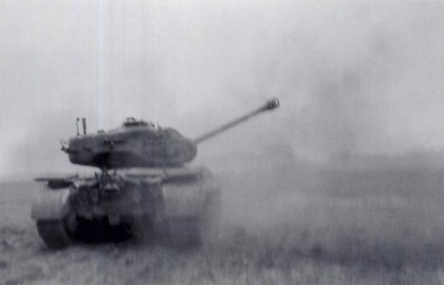 An M26 Pershing fires at German positions across the Rhine.