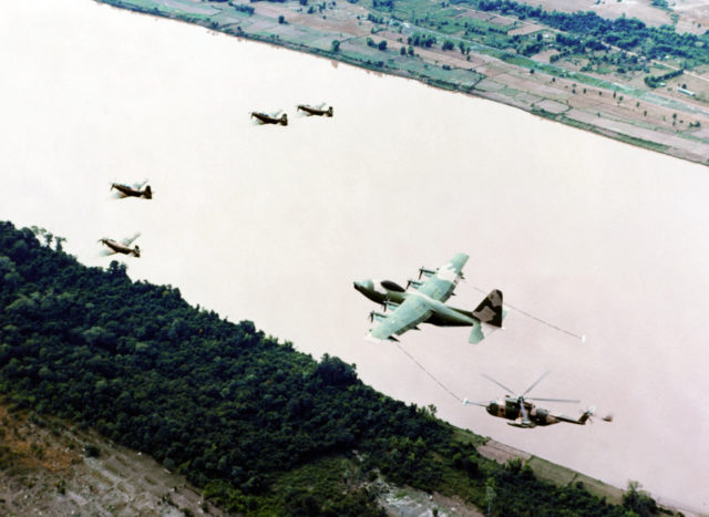 A flight from the 37th ARRS flying towards a rescue site. With in flight refueling, the HH-3Es could fly incredibly long distances. 