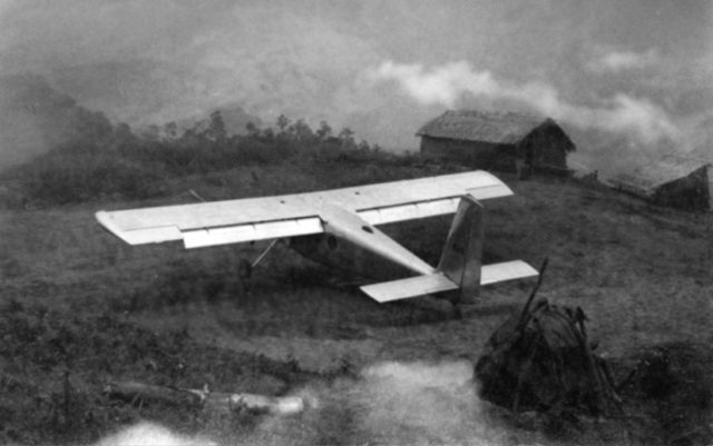Air America U-10D Helio Courier aircraft in Laos on a covert mountaintop landing strip (LS) "Lima site"