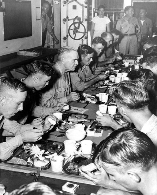Admiral William Halsey having Thanksgiving dinner with the crew of battleship USS New Jersey, his flagship, 30 Nov 1944.