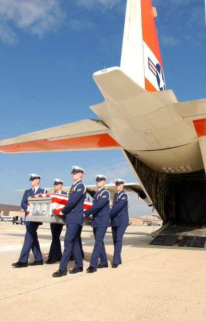 The remains of Lieutenant Jack Rittichier return to the United States. Carried off of a USCG C-130 at Andrews Air Force Base. 