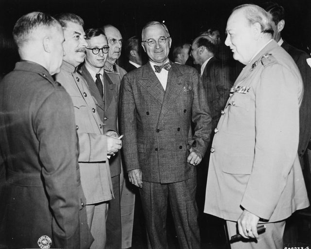 Joseph Stalin, Harry S. Truman, and Winston Churchill in Potsdam, July 1945. Photo Credit.