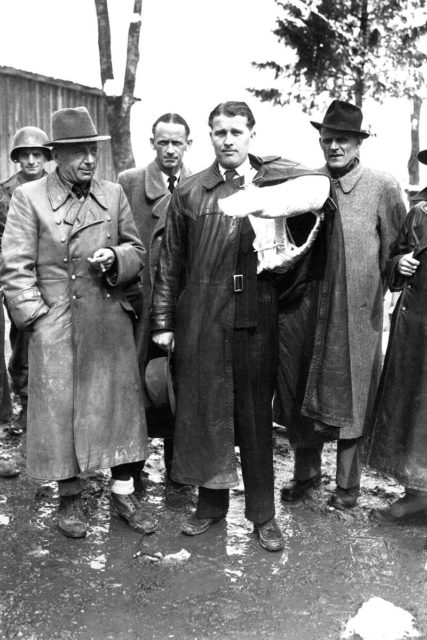 Von Braun (in the arm cast) shortly before his surrender to American troops.