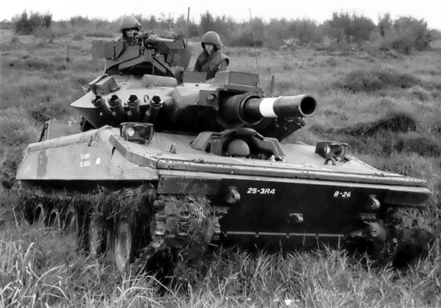 An M551 Sheridan and crew of the 3rd Squadron, 4th Cavalry in Vietnam (Note the add-on belly armor)