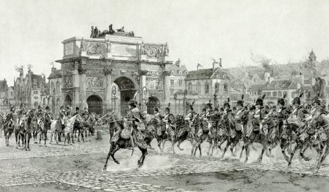 "La Revue 1810". Napoleon I, on horseback, reviewing cavalry troops passing behind the Arc de Triomphe du Carrousel in Paris in 1810. Etching by Auguste Boulard (fils) (1852-1927) after François Flameng (1856-1923)