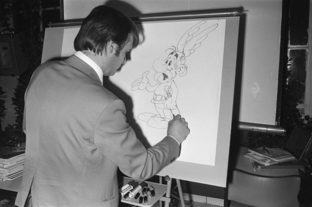 Asterix co-creator Albert Uderzo draws the famous character in Amsterdam, 1971. Photo Credit