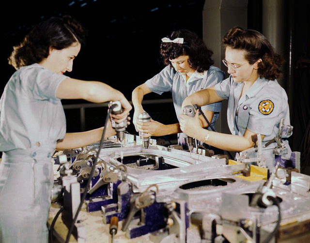 Consolidated Women Workers assembling a wing section.