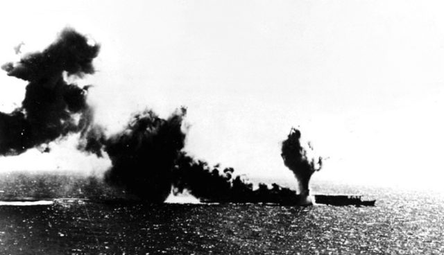The Japanese ship Shoho burns after an explosion during the Battle of the Coral Sea. 