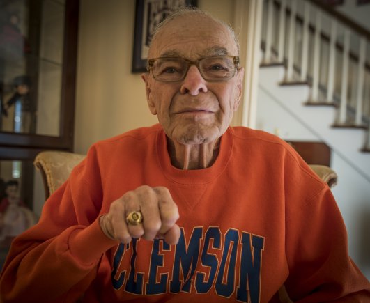 Former U.S. Army 1st Lt. William H. Funchess, 89, who endured 34 months as a prisoner of war during the Korean War, displays his Clemson University Class of 1948 ring at his home in Clemson, S.C., Sept. 21, 2016. Funchess was held in the same prison compound and became very close to Army Chaplain Father Emil J. Kapaun, who received the Medal of Honor posthumously in 2013 for his acts of courage and compassion as a prisoner of war. Credit: U.S. Army photo by Staff Sgt. Ken Scar.