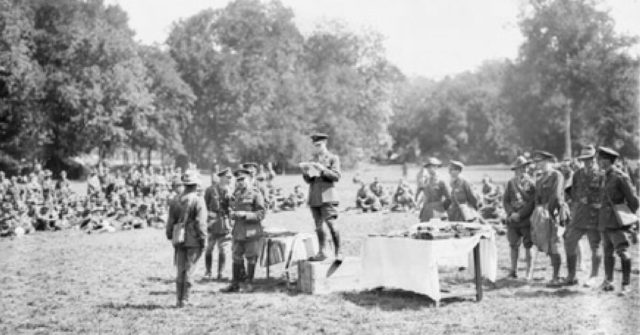 Lieutenant General Sir John Monash KCB VD, presenting decorations to members of the 4th Australian Infantry Brigade, after their success in the Battle of Hamel.