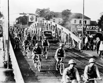 Japanese troops entering Saigon by bicycle in 1941.