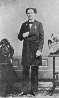 Mary Edwards Walker looking more like herself, in a man’s suit and posing as men would for a 19th-century photograph;