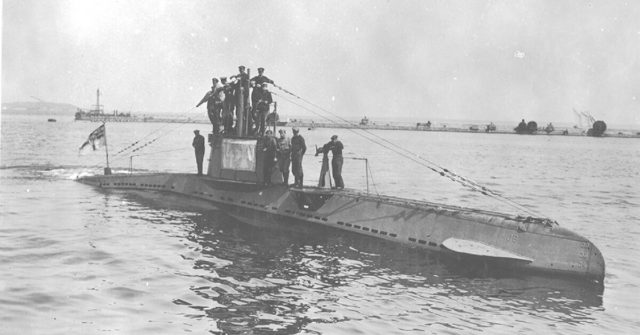 German WWI U-boat UB 14 on the surface of the Black Sea. The submarine’s crew is gathered around the tower.