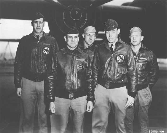 Crew No. 1 in front of B-25 on the deck of Hornet, 18 April 1942. From left to right: (front row) Lt. Col. Doolittle, pilot; Lt. Richard E. Cole, copilot; (back row) Lt. Henry A. Potter, navigator; SSgt. Fred A. Braemer, bombardier; SSgt. Paul J. Leonard, flight engineer/gunner.