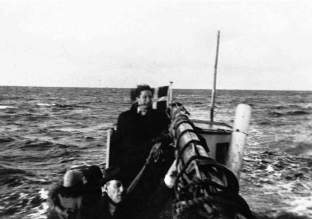 Danish Jews on a fishing boat on the Øresund Strait bound for Sweden; By Nationalmuseet National Museum of Denmark – CC BY SA 2.0