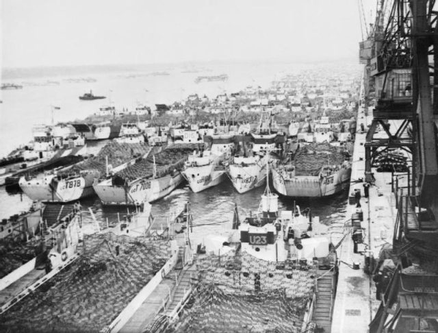 Landing craft assembled along the quayside at Southampton, waiting for D Day.June 1944