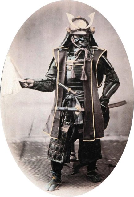 Samurai in armor, 1860s. Hand-coloured photograph by Felice Beato.
