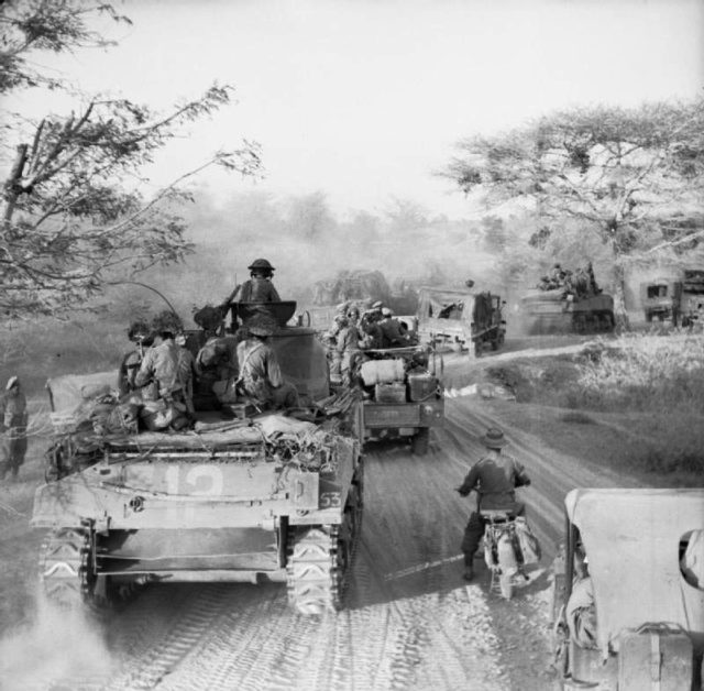 Sherman tanks and trucks of the 63rd Motorized Brigade making their way to Meiktila in March 1945;