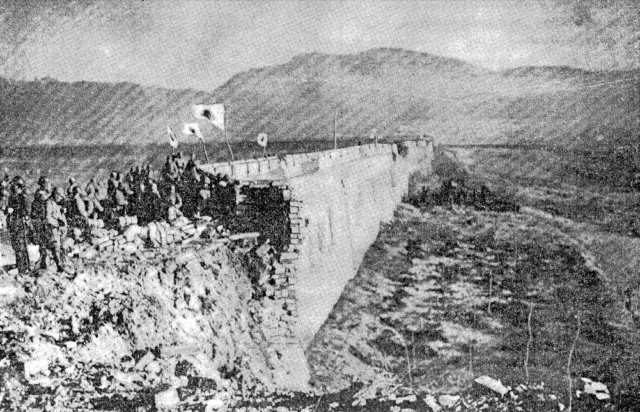 Japanese soldiers on top of what was left of Nanking’s Zhingshan Gate on December 13, 1937.