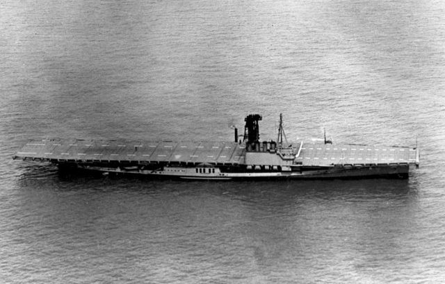 The U.S. Navy coal burning training carrier USS Wolverine (IX-64) lying at anchor in Lake Michigan (USA) on 6 April 1943.